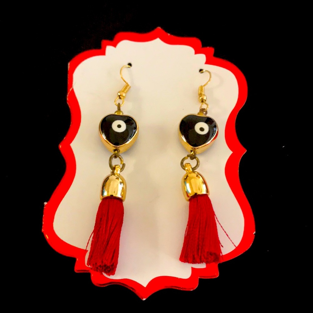 1x$5.00 or 2 x $8.00 Earring Black hearts with evil eye. Red tassels